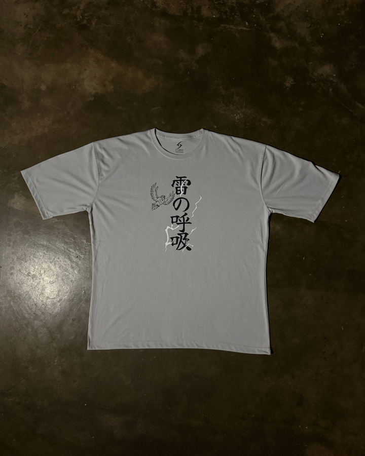 Anime-inspired apparel featuring bold back artwork, worn by a model in a dark studio setting – from a South African anime clothing brand.