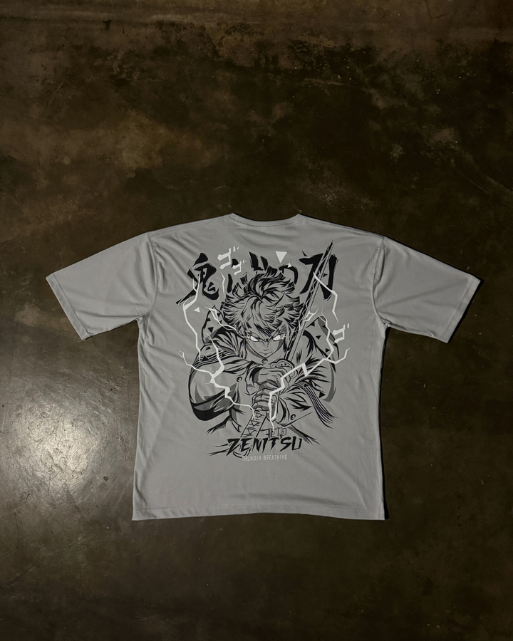 Anime-inspired apparel featuring bold back artwork, worn by a model in a dark studio setting – from a South African anime clothing brand.