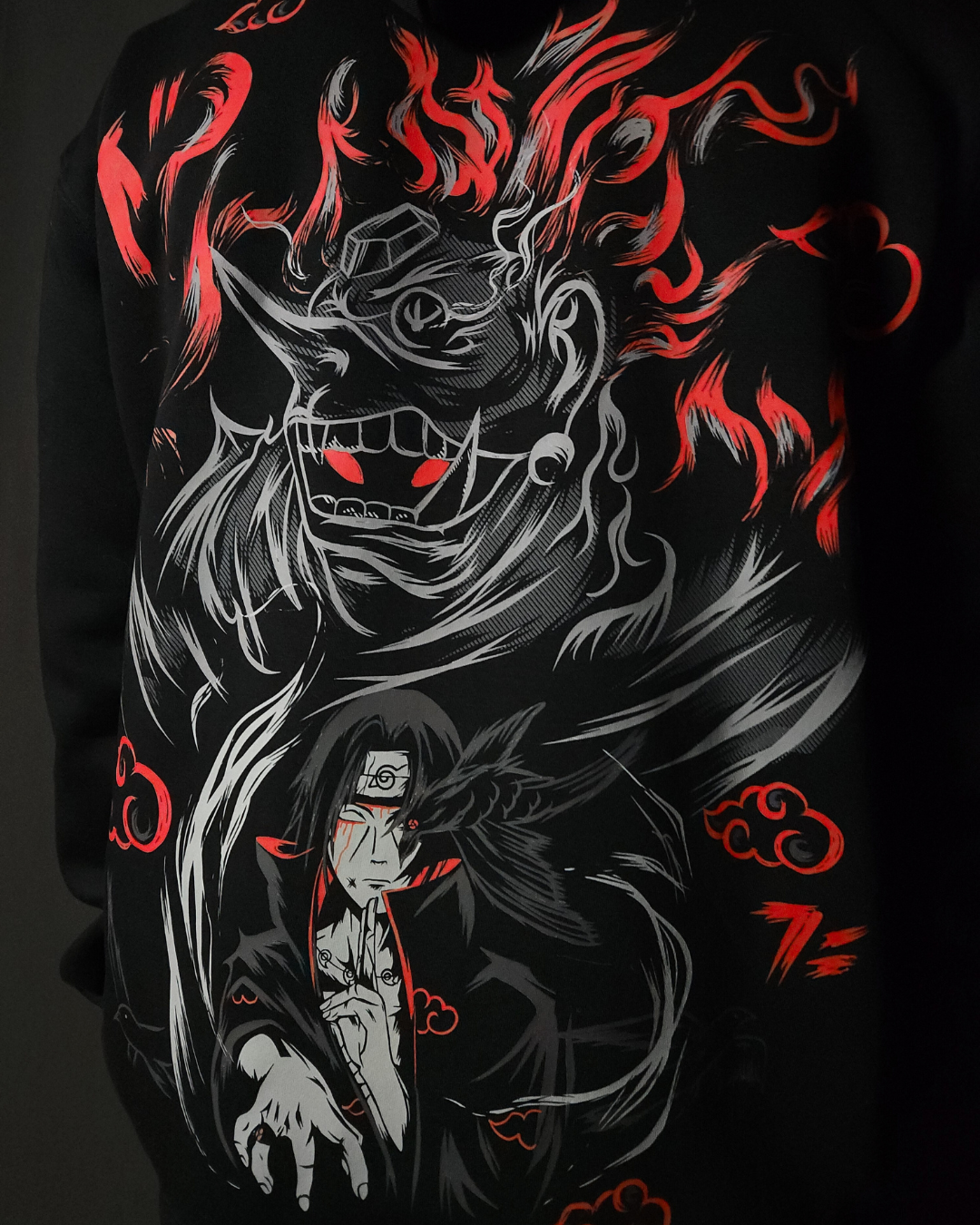 Anime-inspired apparel featuring bold back artwork, worn by a model in a dark studio setting – from a South African anime clothing brand.