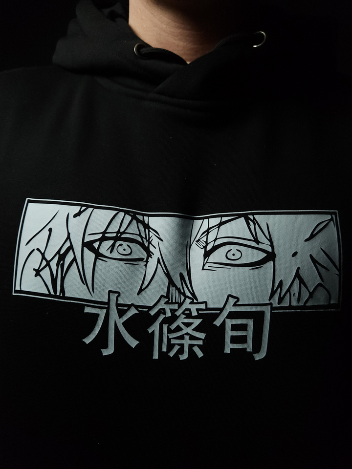 Anime-inspired apparel featuring bold back artwork, worn by a model in a dark studio setting – from a South African anime clothing brand.