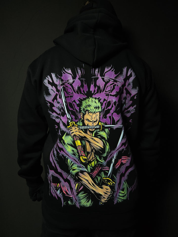 Anime-inspired apparel featuring bold back artwork, worn by a model in a dark studio setting – from a South African anime clothing brand.