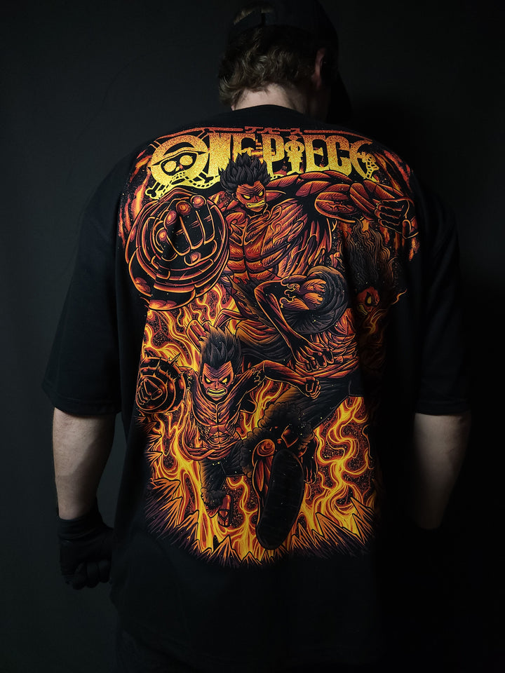 Anime-inspired apparel featuring bold back artwork, worn by a model in a dark studio setting – from a South African anime clothing brand.