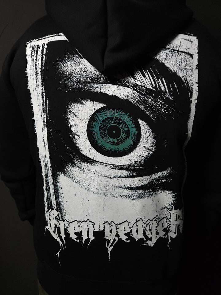 Anime-inspired apparel featuring bold back artwork, worn by a model in a dark studio setting – from a South African anime clothing brand.