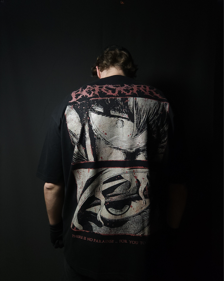 Anime-inspired apparel featuring bold back artwork, worn by a model in a dark studio setting – from a South African anime clothing brand.